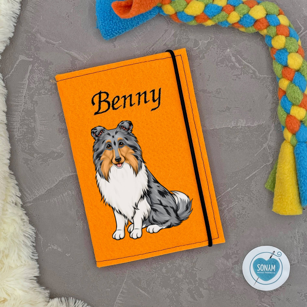 Designbeispiel der Impfpasshülle orange für die Hunderasse Collie Langhaar blue merle